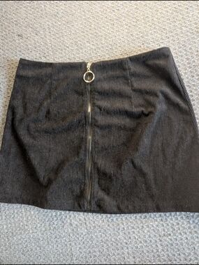 Cider Black Corduroy Zip-Front Mini Skirt with Ring Pull